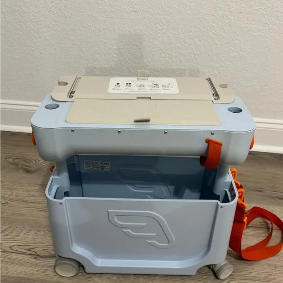 JetKids by Stokke BedBox Kid's Ride-On Suitcase Light Blue Clean W/bedding pad - Picture 8 of 11